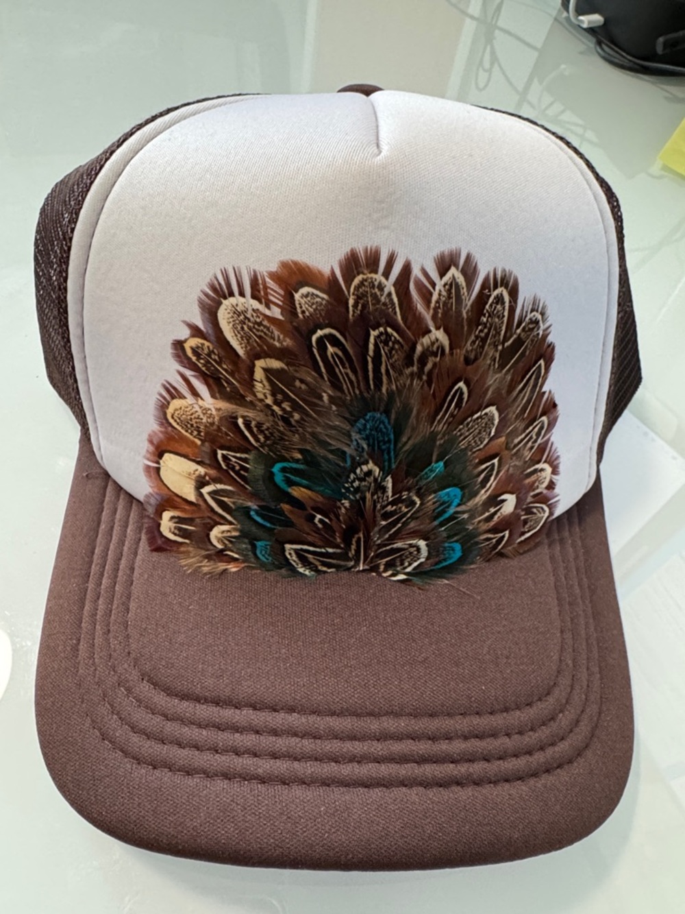 Brown and White Feather Patch Trucker Hat
